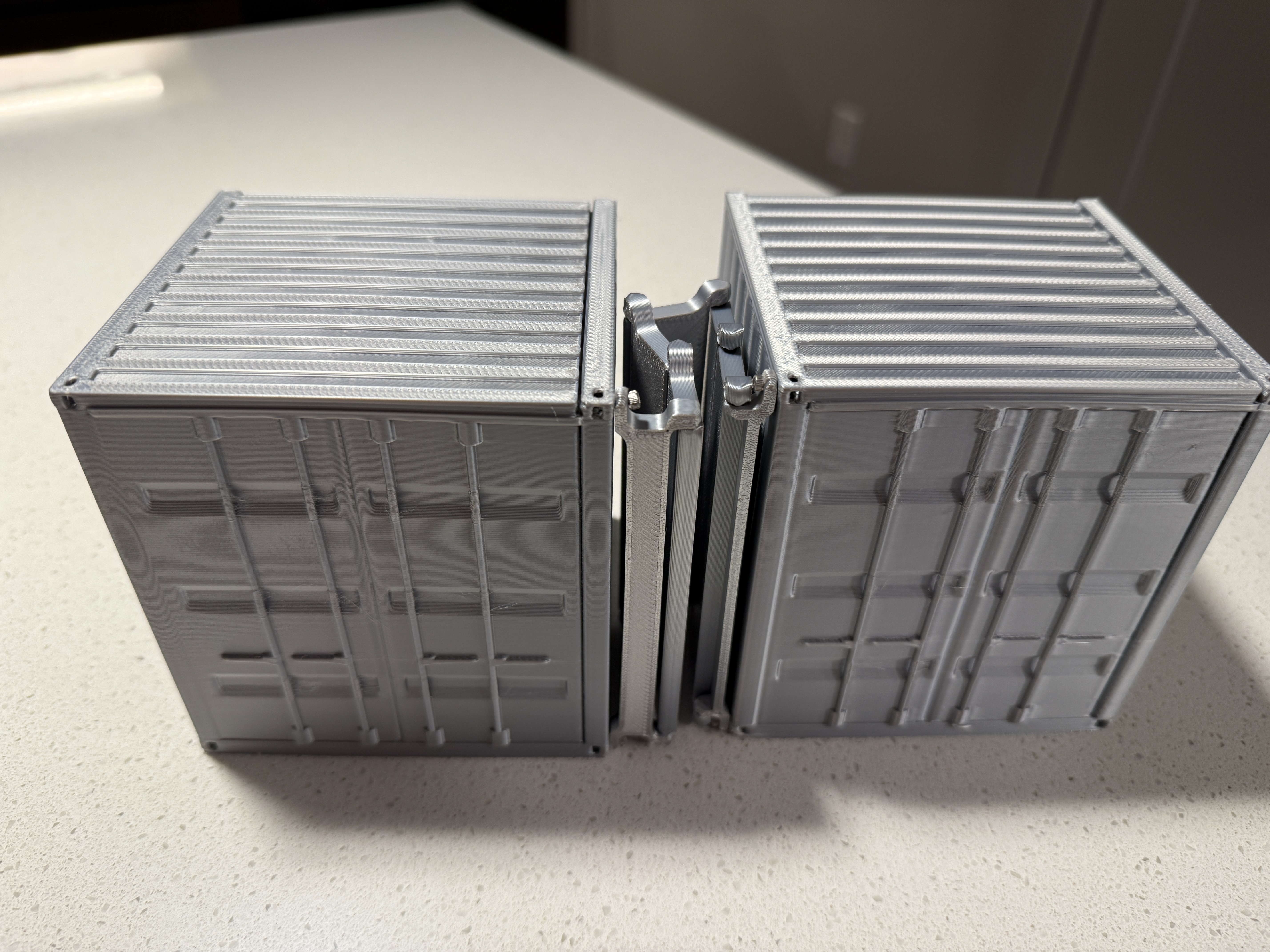 3D printed scaled prototype of the interlocking modular shipping container wall panels
