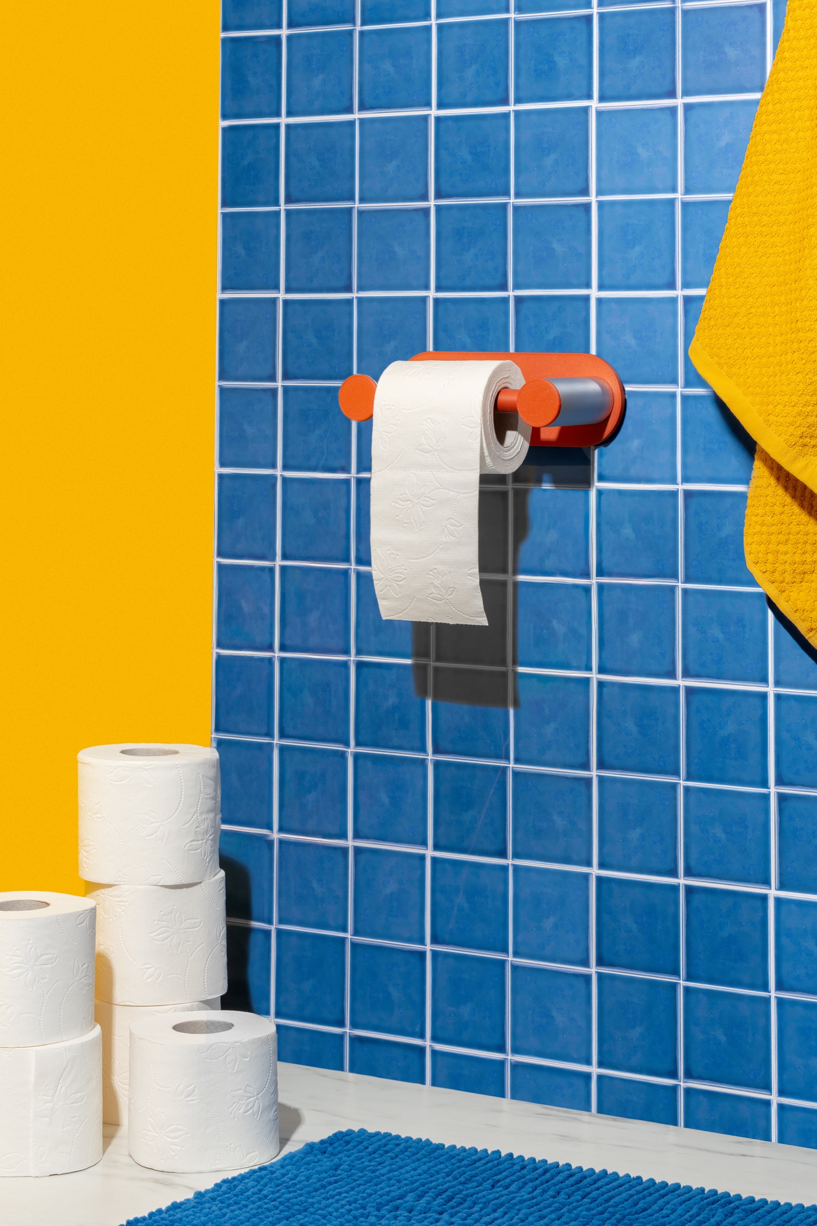 Close-up view of Roto toilet paper holder geometry and finish