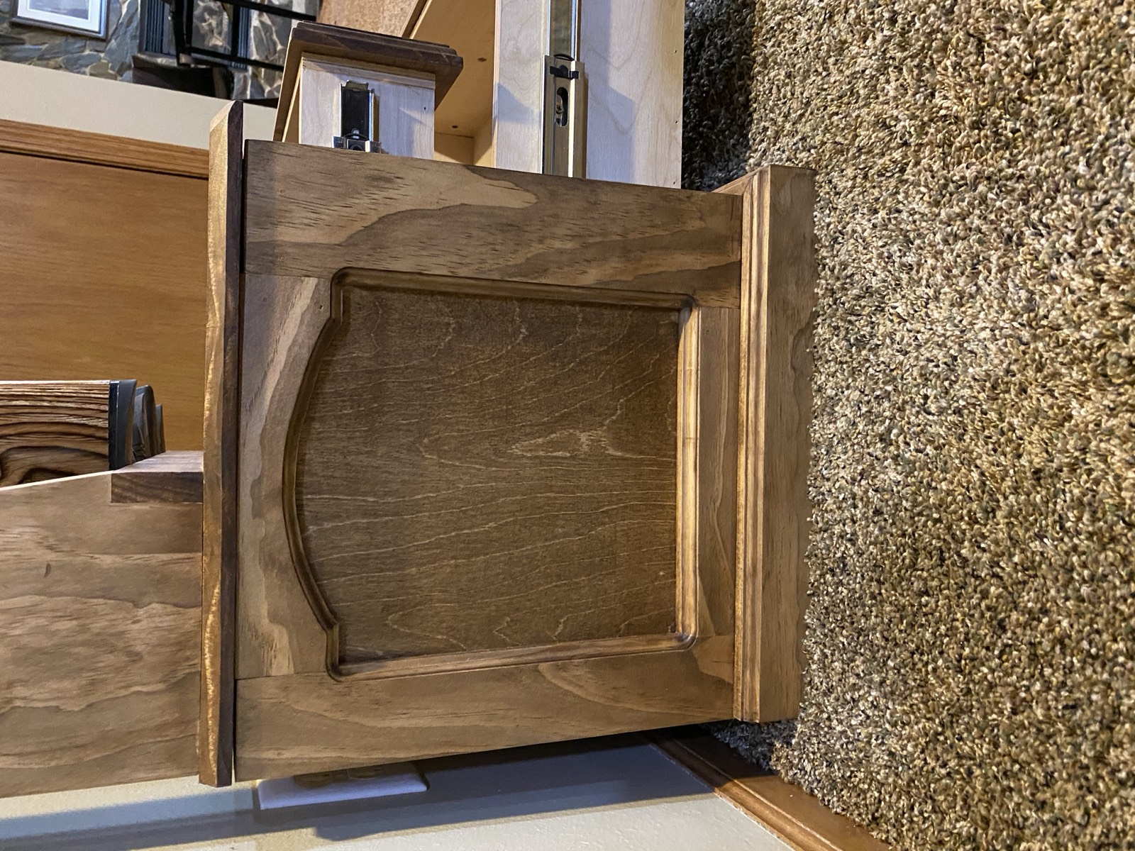 Close-up of the raised side panel detail after staining