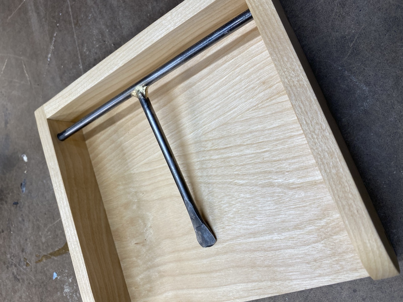 Top-down view showing the brazed T-joint and forged flat end