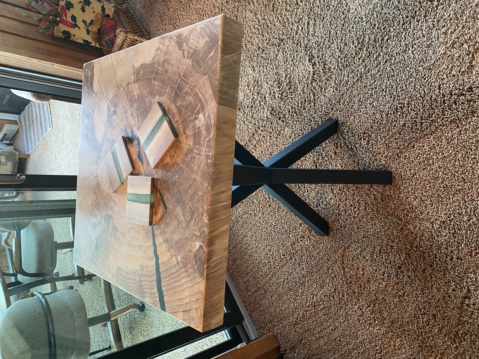 Finished pub table in home with epoxy-filled slab top on welded steel base