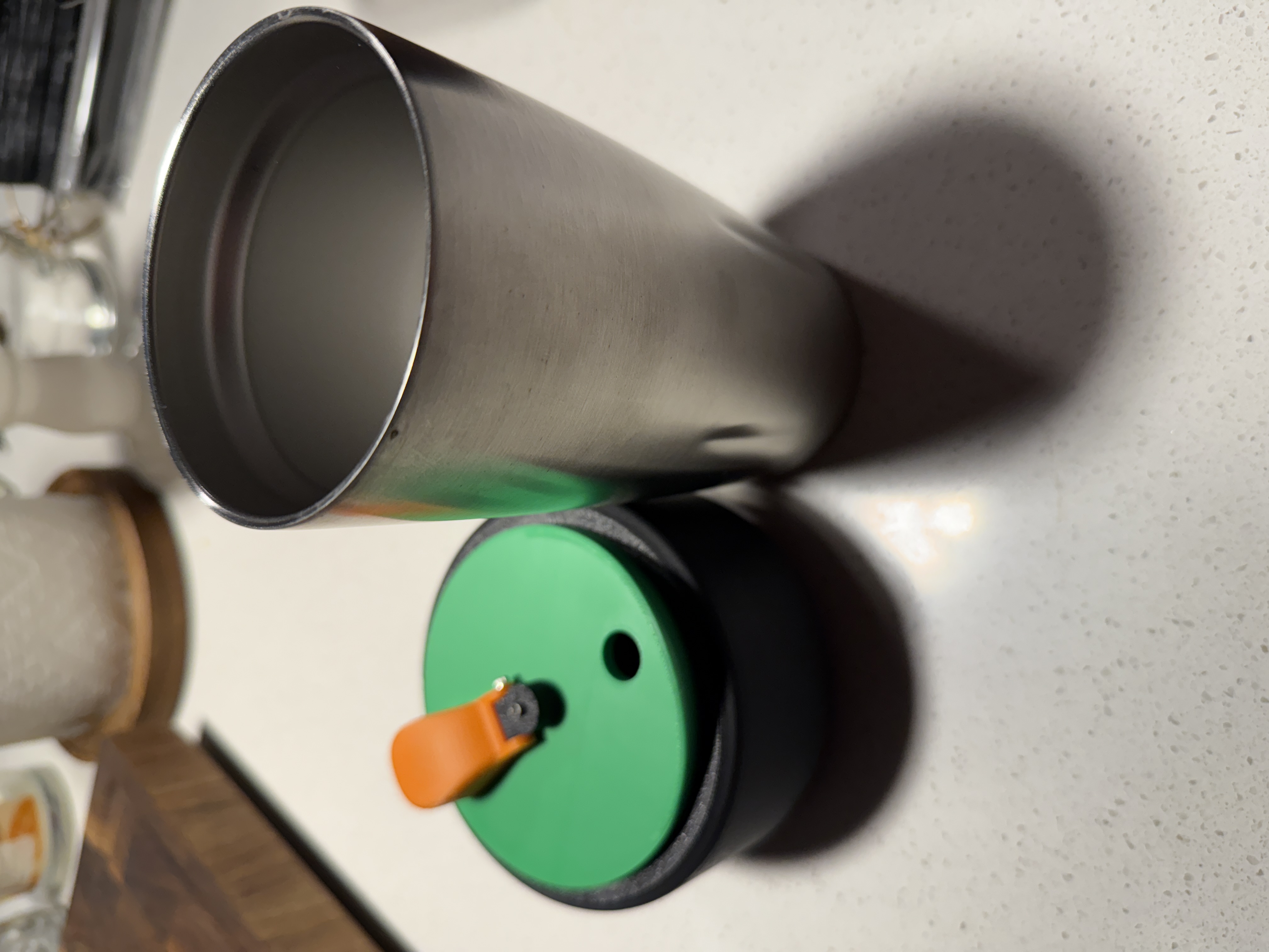 Universal silicone lid on a bottle